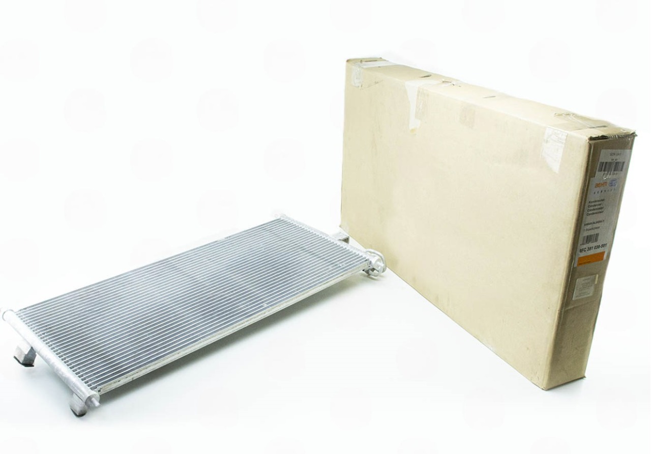 радиатор кондиционера Nissan Almera N16 1.5/1.8 (00->) мкпп   (HELLA)